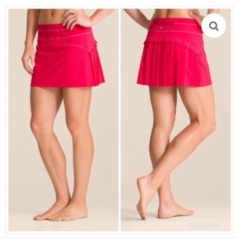 Athleta Runaround Pleated Skirt/Skort
Size: Small 
Color:  Coral Pink